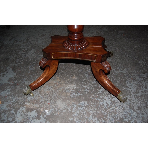 69 - Regency Rosewood Swivel Top Folding Card Table with Brass stringing on Sabre Legs