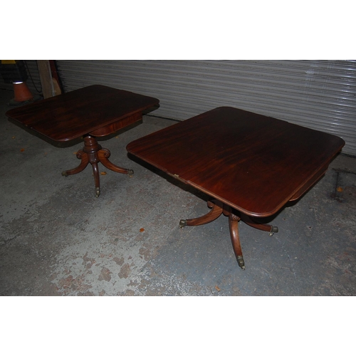 74 - Pair of W IV Mahogany swivel top folding tea tables with turned columns and quadruple sabre legs and... 