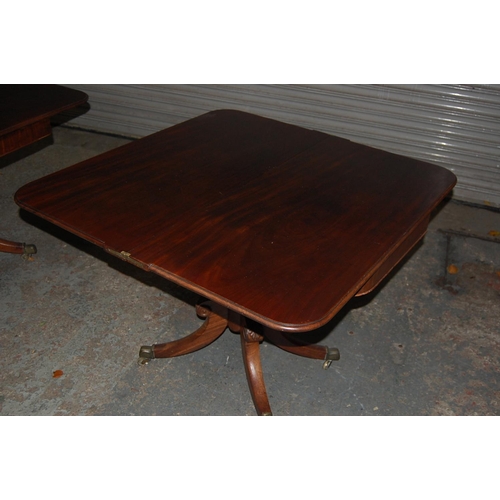 74 - Pair of W IV Mahogany swivel top folding tea tables with turned columns and quadruple sabre legs and... 