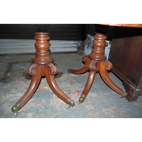 74 - Pair of W IV Mahogany swivel top folding tea tables with turned columns and quadruple sabre legs and... 