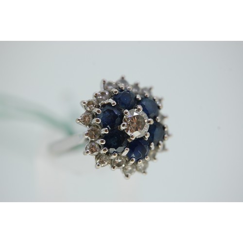 23 - Sapphire and Diamond cluster ring set in 18ct White Gold, Size L/M