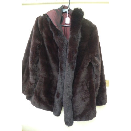 421 - Ladies reversible burgundy fur coat with hood and fur trim - size 14