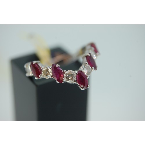 178 - 18ct white gold wishbone ring with marquise shaped rubies and brilliant cut diamonds. Size M/N