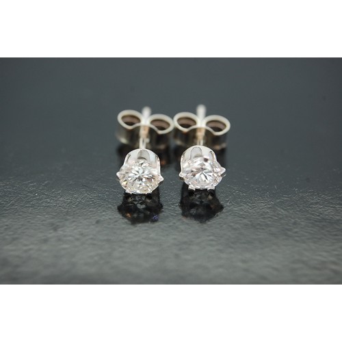 351 - Pair of Diamond Earstuds Set in Silver, 0.8ct Total