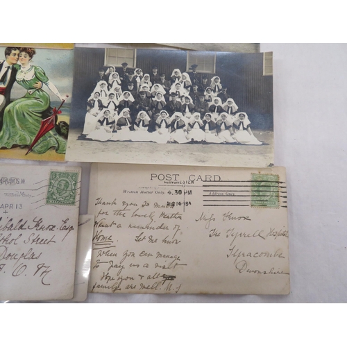 106 - Miss M Knox's small postcard album, containing a postcard addressed to Archibald Knox, Photographs o... 