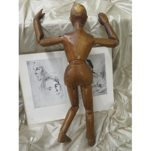 34 - 1930s wooden artists articulated mannequin and a book of Augustus John darwings