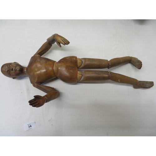 34 - 1930s wooden artists articulated mannequin and a book of Augustus John darwings