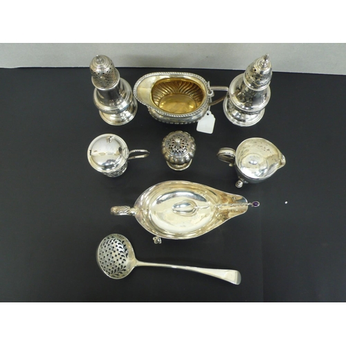 225 - A collection of Georgian and later Silver, Muffineer, peppers, cream jugs, sugar, silver spoon and m... 