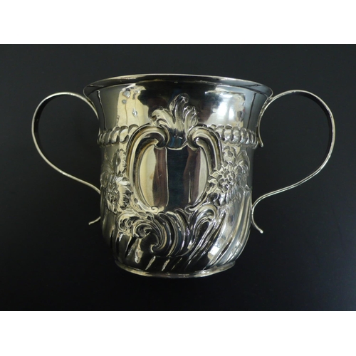 226 - George II two handled chased silver beaker, Ht. 2.75ins, London 1756, 3ozt, Makers William Shaw and ... 