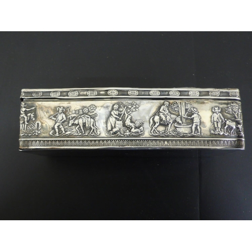 228 - 19thC Continental chased rectangular silver box with scenes of stag hunting and figures and animals ... 