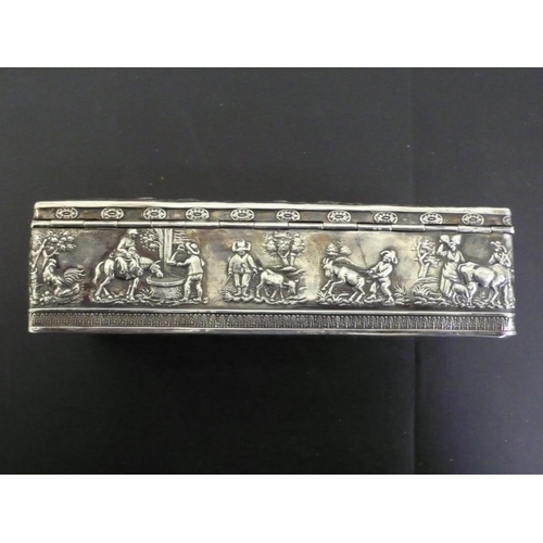 228 - 19thC Continental chased rectangular silver box with scenes of stag hunting and figures and animals ... 