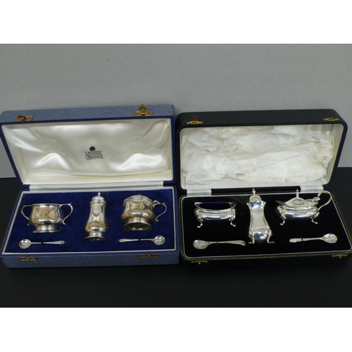 238 - Cased Garrard & Co silver salt, pepper and mustard, plus two spoons, plus another cased set, London ... 