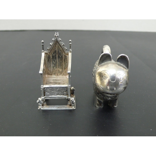 240 - Japanese sterling Silver cat pepper pot with screw on head and floral decoration to saddle, length 2... 