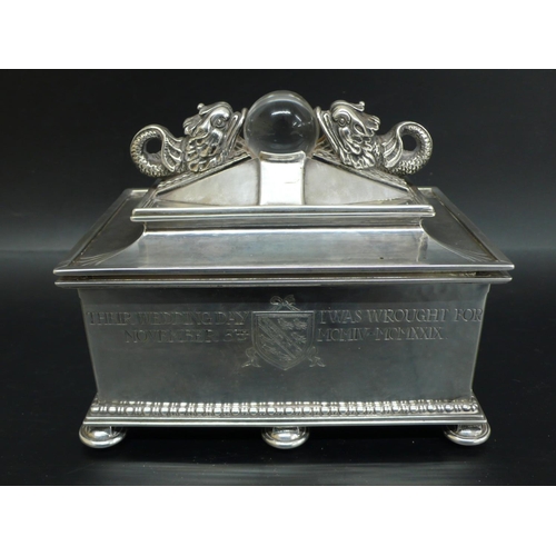 244 - Omar Ramsden rectangular silver casket with two dolphins facing each other holding a glass orb in th... 