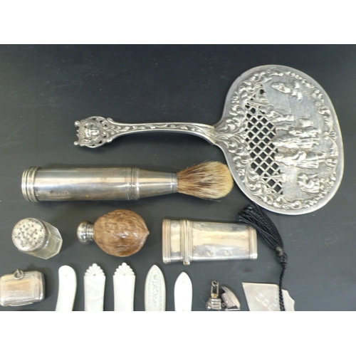 A collection of antique silver curiosities including fruit knives ...