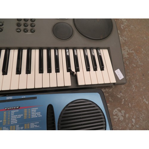 102 - Two Yamaha keyboards, one B200, one DJ-X