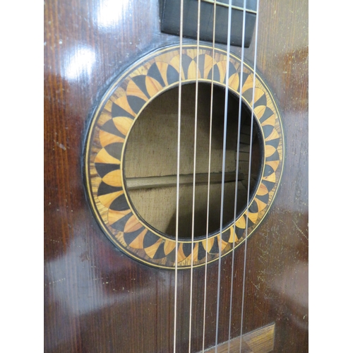 189 - Unusual nylon string acoustic guitar with spruce top, mother of pearl inlay to the neck, marquetry w... 