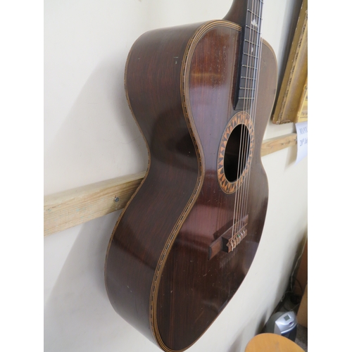 189 - Unusual nylon string acoustic guitar with spruce top, mother of pearl inlay to the neck, marquetry w... 