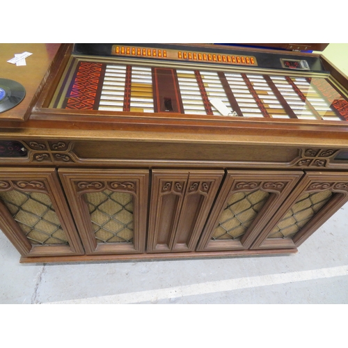 206 - Circa 1970s Wurlitzer Cabaret Jukebox - Made in West Germany -  material front speakers and central ... 