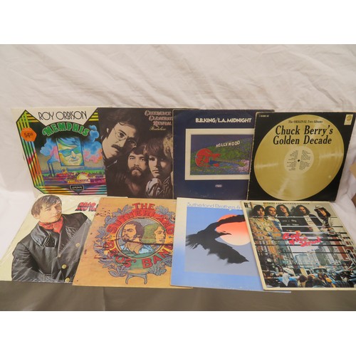 261 - Collection of assorted LPs including Elton John, Slade, Creedence Clearwater Revival