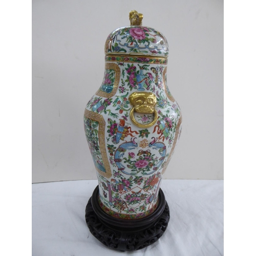 149 - Canton porcelain urn with cover having good decoration of birds, insects, flora and fauna. Lion dog ... 