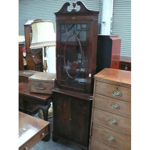 122 - Mahogany corner cabinet with urn finial, single glazed door with cupboard under on bracket feet