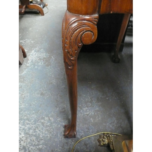 125 - Walnut veneered folding card table in the Georgian style