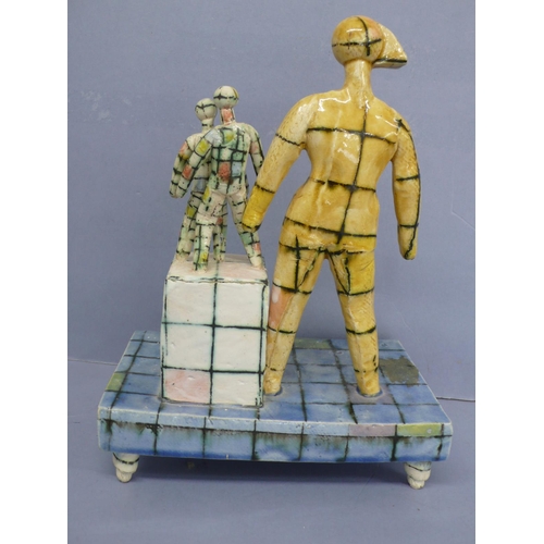 126 - Martin Hearne, Mannequins on pedestals, porcelain with multicoloured glazes, ht. 9.75ins