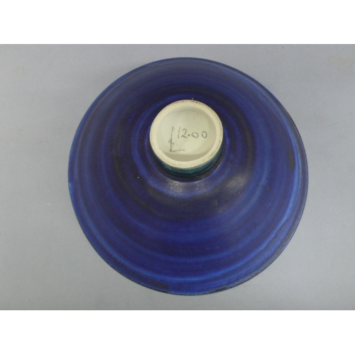 129 - Mary Rich, conical shaped porcelain bowl with small circular foot in blue and black glazes, height 4... 