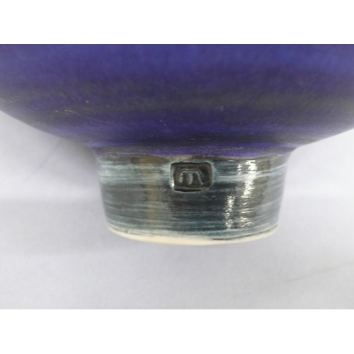 129 - Mary Rich, conical shaped porcelain bowl with small circular foot in blue and black glazes, height 4... 