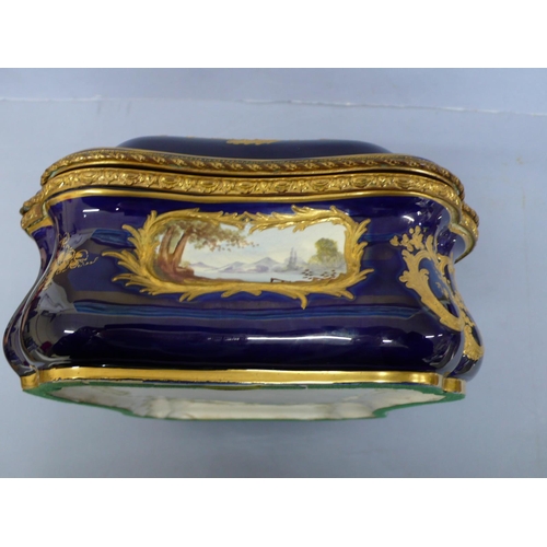 13 - Sevres style porcelain and gilt metal mounted serpentine sided box having hand painted scene of figu... 