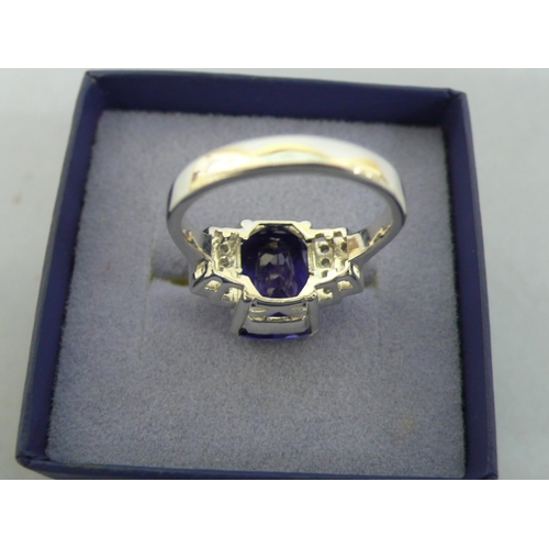 136 - Good 18ct white gold Art Deco style cushion cut tanzanite ring with diamond shoulders, tanzanite app... 