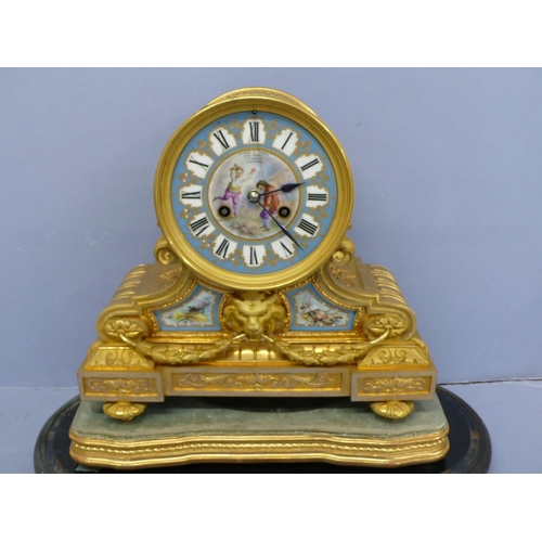 137 - 19thC Ormolu mantel clock with Sevres porcelain dial and panels with lion mask to front on adjustabl... 