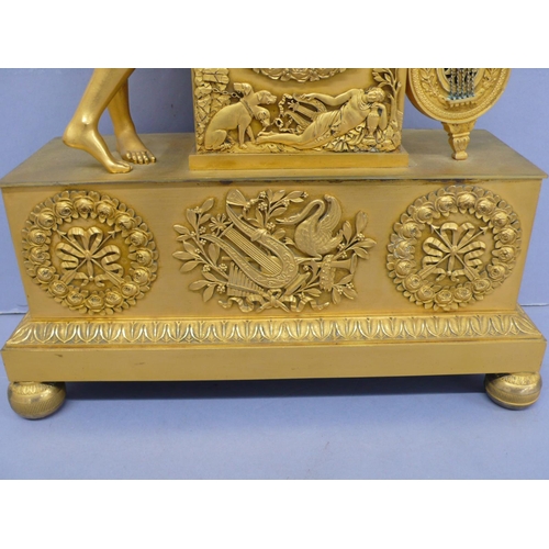 140 - An early 19thC French ormolu mantel clock with figure playing a lyre to top, white enamel chapter ri... 