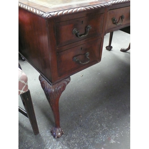 157 - Mahogany desk with green leather insert to top, five drawers, carved cabriole legs, width 49ins