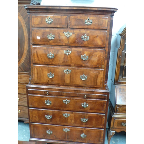 165 - George III walnut chest on chest with crossbanded drawers, reeded canted corners, pierced brass escu... 