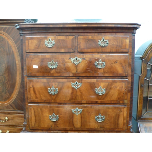 165 - George III walnut chest on chest with crossbanded drawers, reeded canted corners, pierced brass escu... 