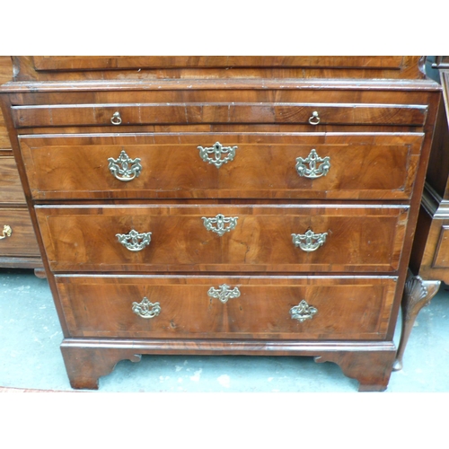 165 - George III walnut chest on chest with crossbanded drawers, reeded canted corners, pierced brass escu... 