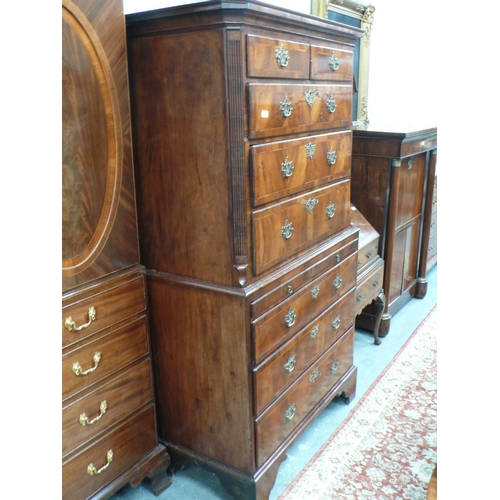 165 - George III walnut chest on chest with crossbanded drawers, reeded canted corners, pierced brass escu... 