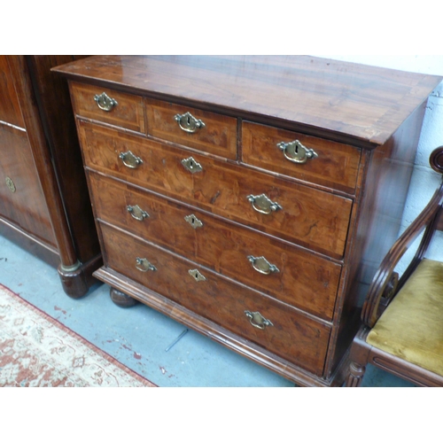 168 - 18thC walnut veneered chest of three short and three long graduated drawers on large bun feet. width... 