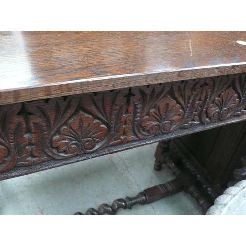 175 - Oak barley twist leg occasional table with a carved frieze