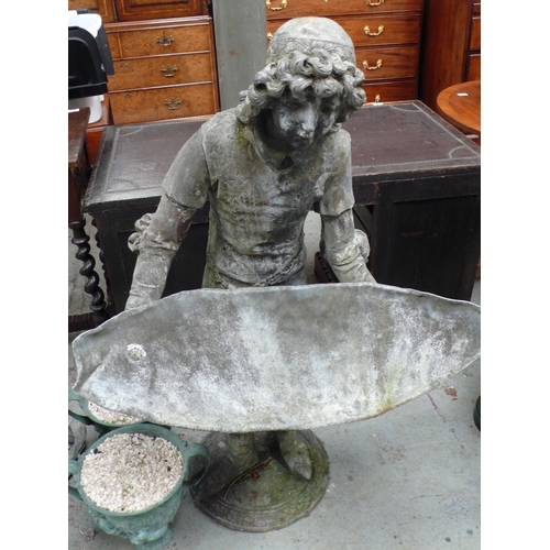 177 - A lead statue of a youth from the middle ages holding a tray - height 48 ins