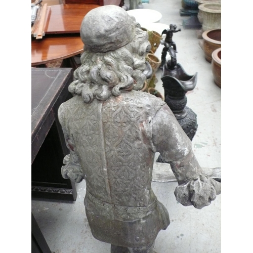 177 - A lead statue of a youth from the middle ages holding a tray - height 48 ins