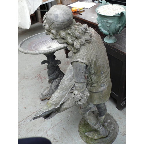 177 - A lead statue of a youth from the middle ages holding a tray - height 48 ins