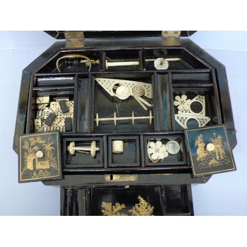 18 - Early 19thC octagonal black laquered sewing/writing box with gilt Chinoiserie decoration, bone fitti... 