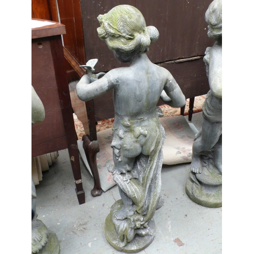 184 - A lead figure of a child holding a butterfly with a horn of plenty at it's feet - size 42 ins approx