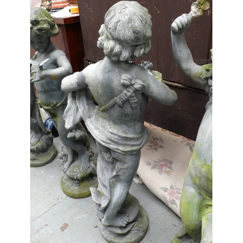 185 - A lead figure of a child holding a nest of fledglings - height 44 ins approx