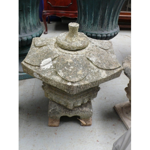 188 - Two Japanese style garden stone ornaments one in the form of a pagoda - tallest 22 ins