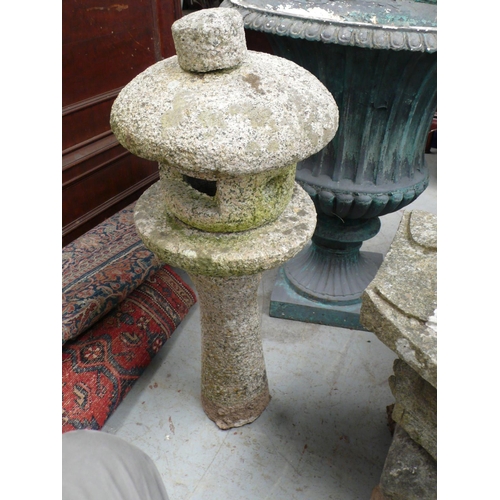 188 - Two Japanese style garden stone ornaments one in the form of a pagoda - tallest 22 ins