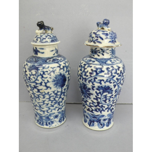 19 - Pair of 19thC Chinese blue and white porcelain urns with decoration of flora, fauna and insects. Fou... 